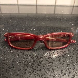 Vintage crystal red Oakley Fours W/ Brown Lenses & black soft case. Made In USA